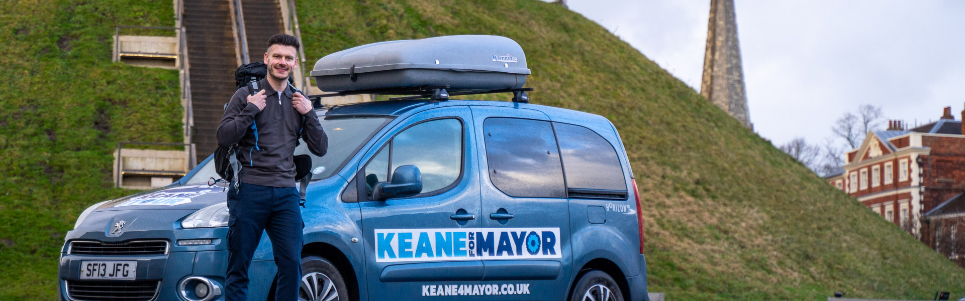 Keane Duncan with his campaign campervan